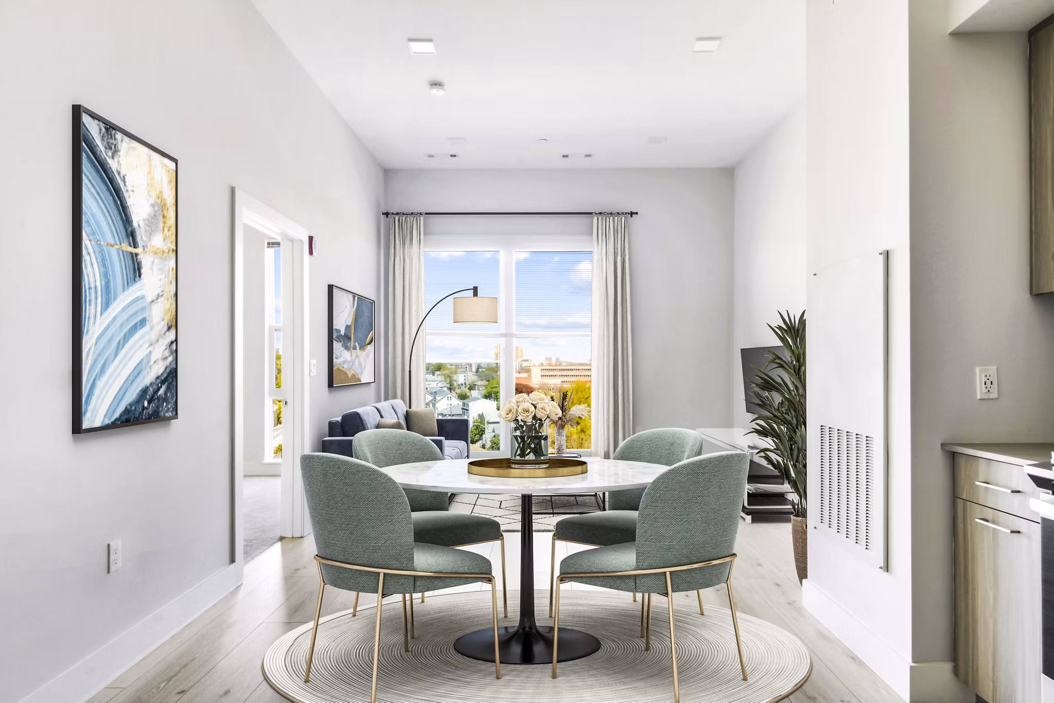 Dine in style in our elegant dining room with modern furnishings at One Beachmont Apartments