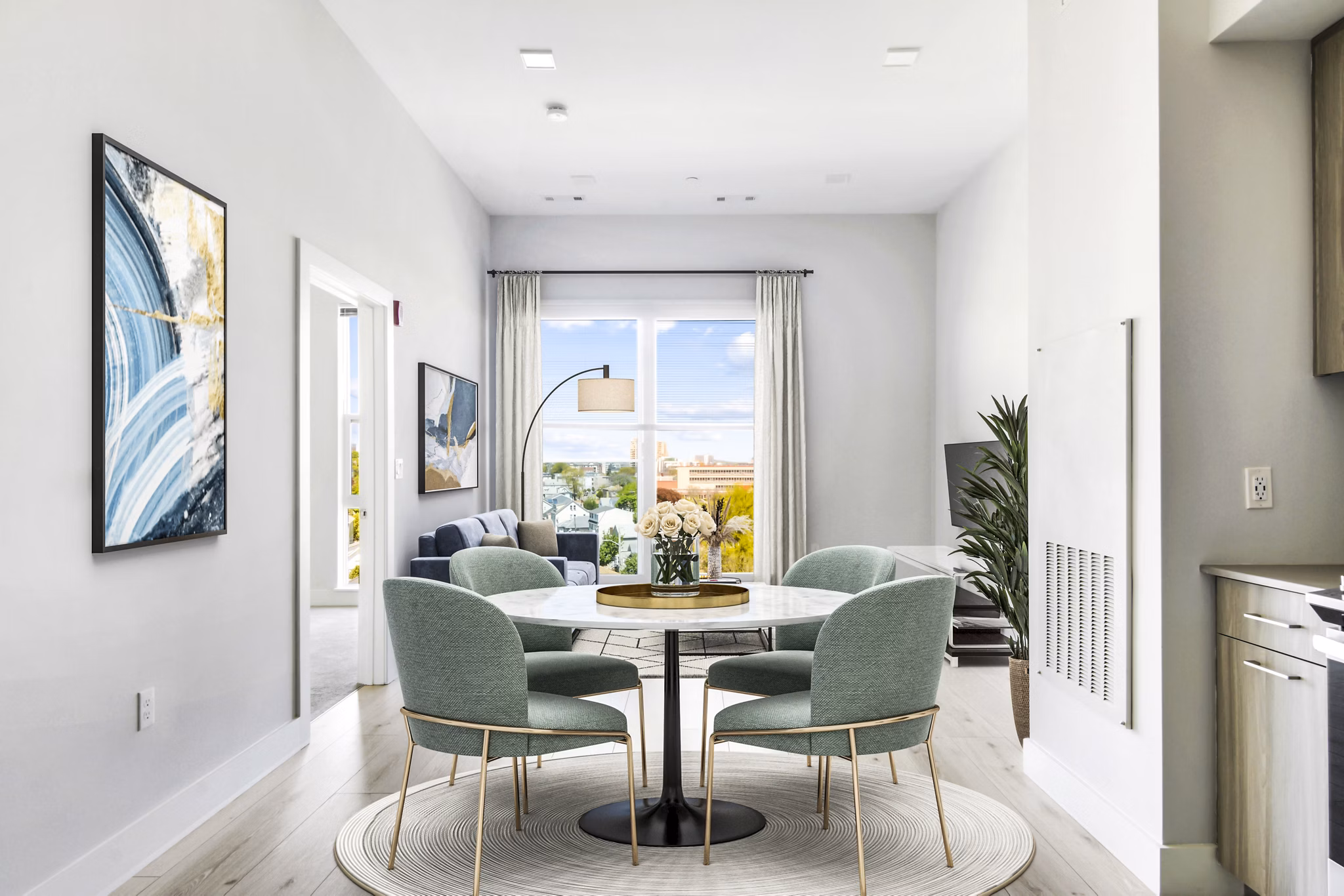 Dine in style in our elegant dining room with modern furnishings at One Beachmont Apartments
