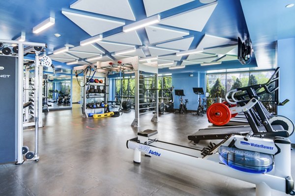State-of-the-art fitness center with modern equipment at One Beachmont Apartments in Revere