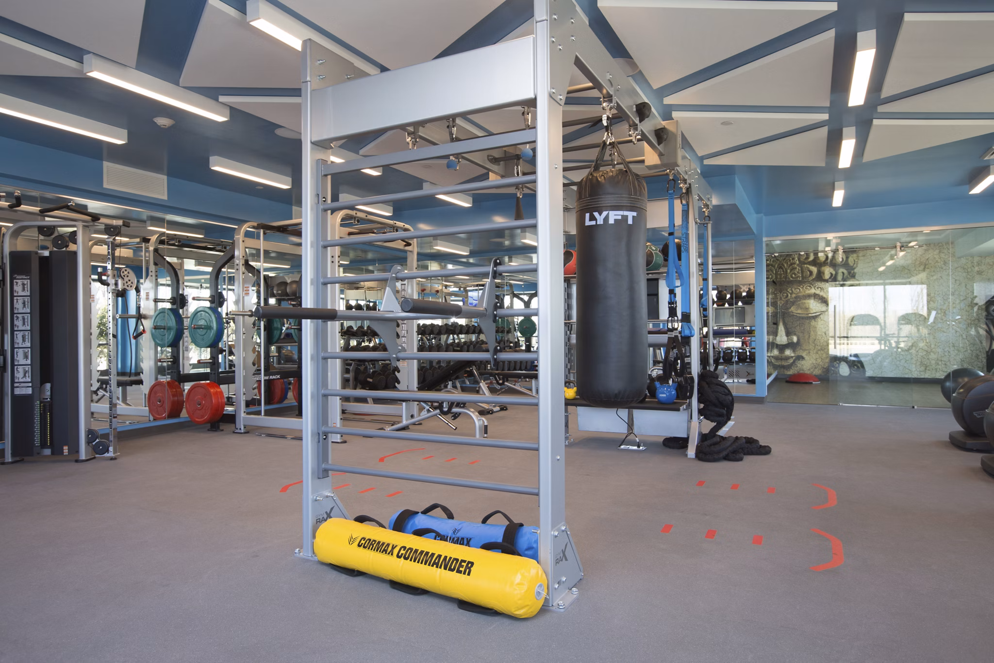 Fitness center with modern equipment at One Beachmont Apartments