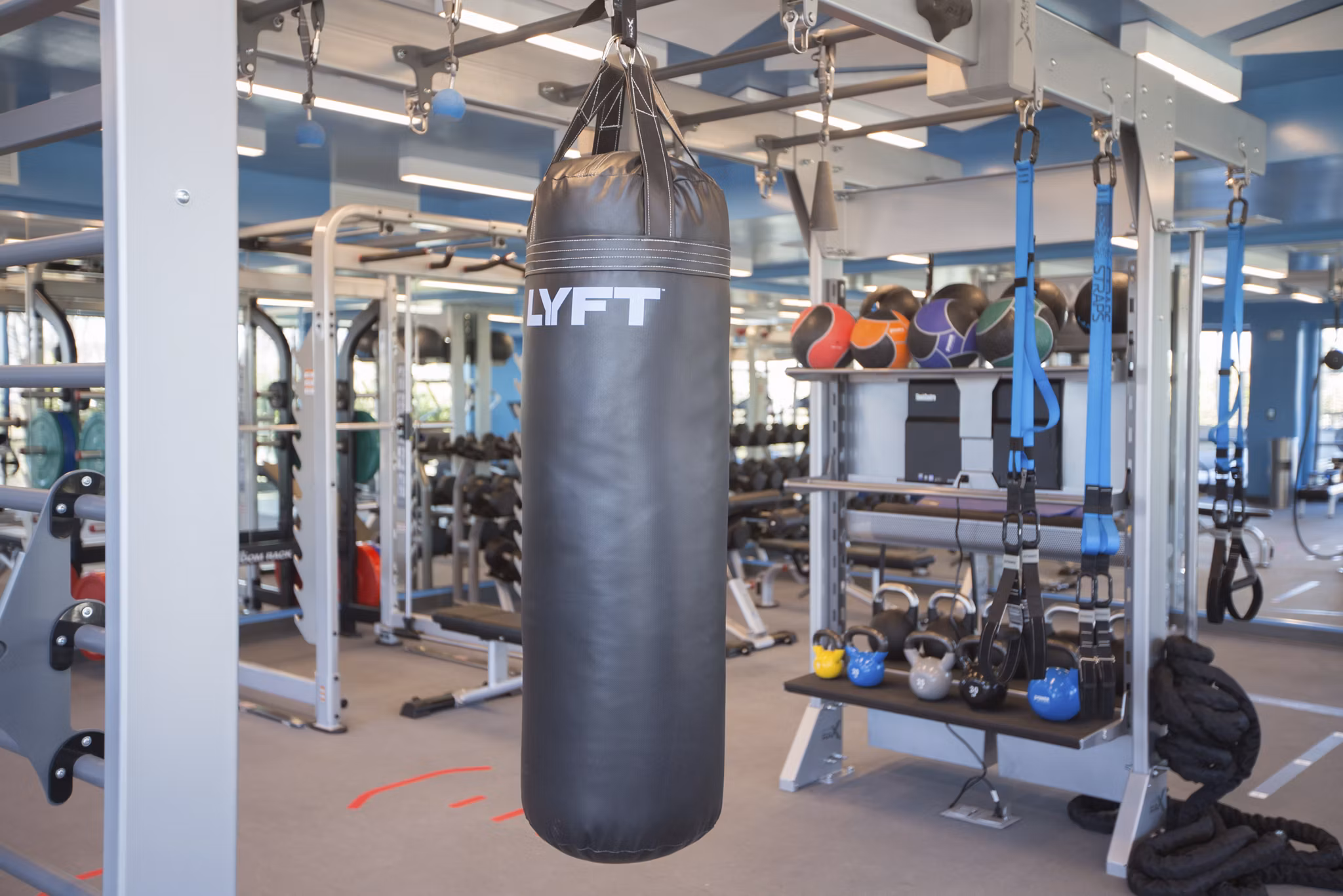 State-of-the-art fitness center with modern equipment at One Beachmont Apartments