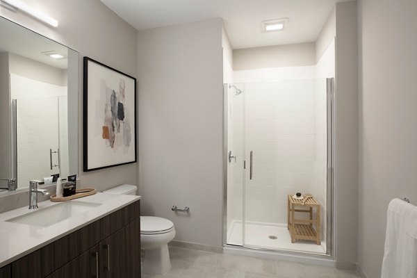 Modern bathroom with sleek fixtures at The Andi Apartments luxury apartments in Boston