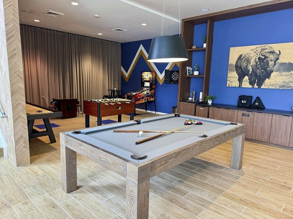 clubhouse game room at The Palmer Apartments