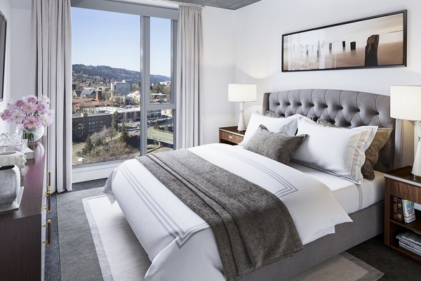 Elegant bedroom with modern decor at Indigo at Twelve West Apartments