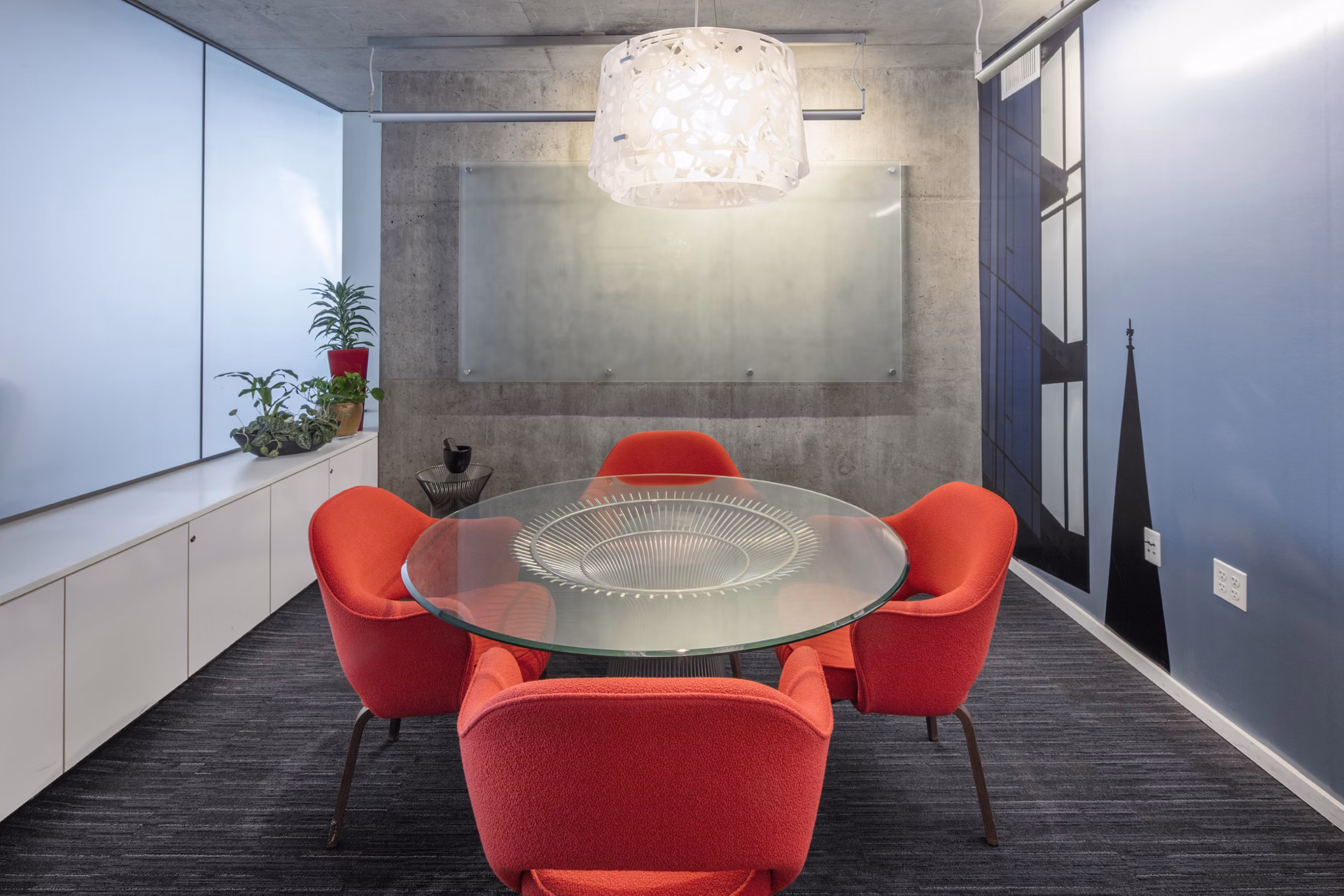 Indigo at Twelve West: Modern meeting facility with ample seating for business gatherings in luxury apartments