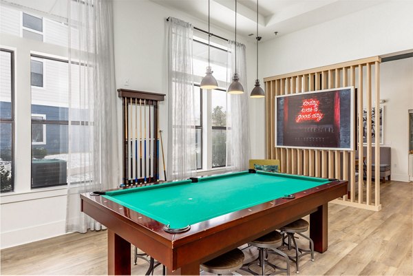 Game room featuring pool tables and arcade games at Domain at Town Centre Apartments