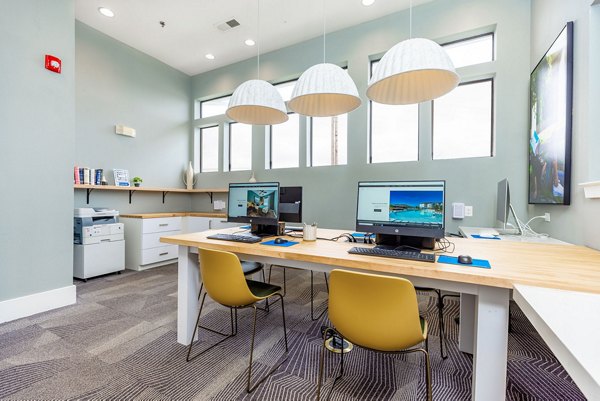 Modern business center with conference tables and high-speed internet at Domain at Town Centre Apartments