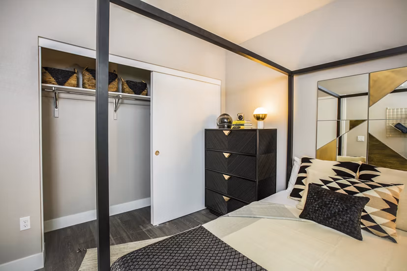 Spacious bedroom featuring modern decor at Fourth Street East Apartments in Emeryville