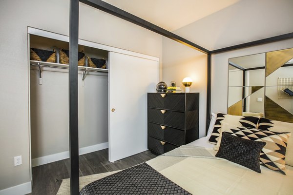 Spacious bedroom featuring modern decor at Fourth Street East Apartments in Emeryville