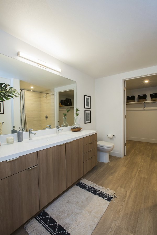 Modern bathroom with sleek finishes at Fourth Street East Apartments