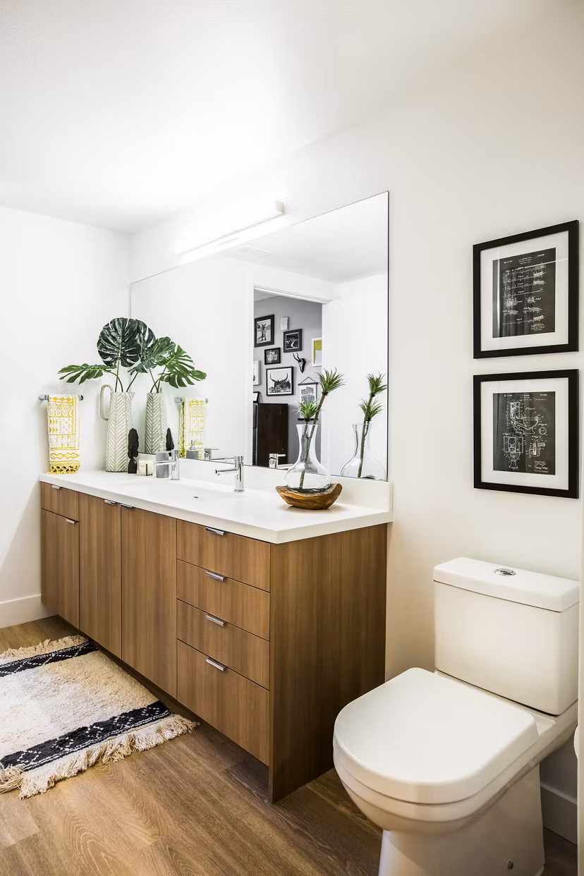 Bathroom featuring modern fixtures and sleek design at Fourth Street East Apartments