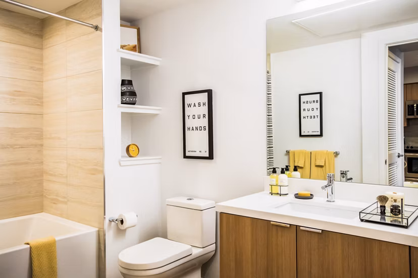 Modern bathroom with sleek fixtures at Fourth Street East Apartments, luxury living by Greystar