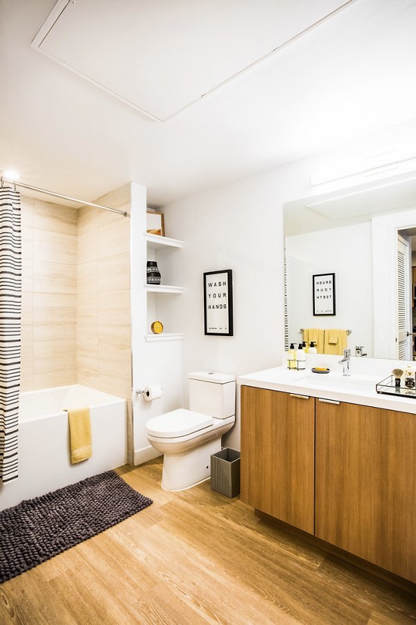 Bathroom featuring modern fixtures at Fourth Street East Apartments with luxury details and elegant design elements