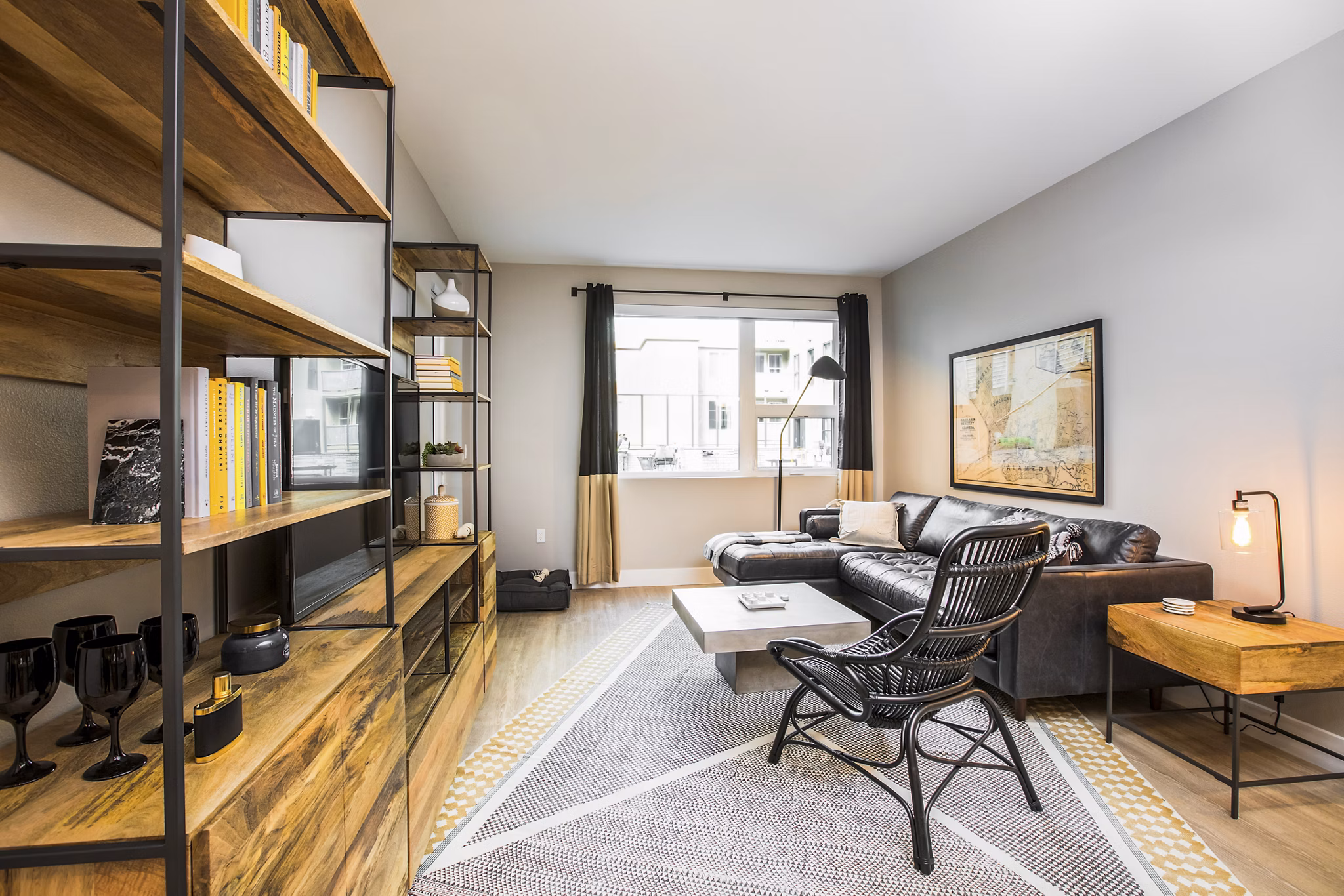 Spacious living room with modern decor at Fourth Street East Apartments