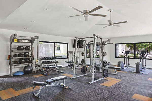fitness center at Finisterra Apartments