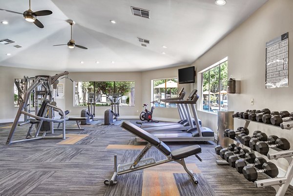 fitness center at Finisterra Apartments