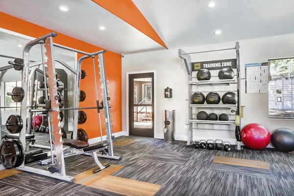 fitness center at Finisterra Apartments