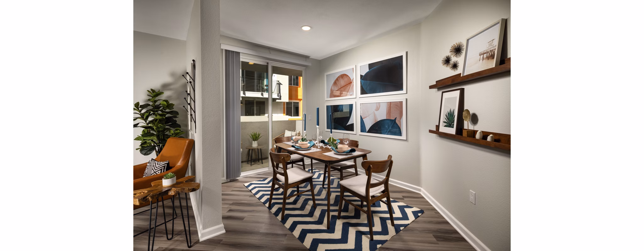 Contemporary dining area with modern furnishings at The District Apartments, a Greystar luxury community