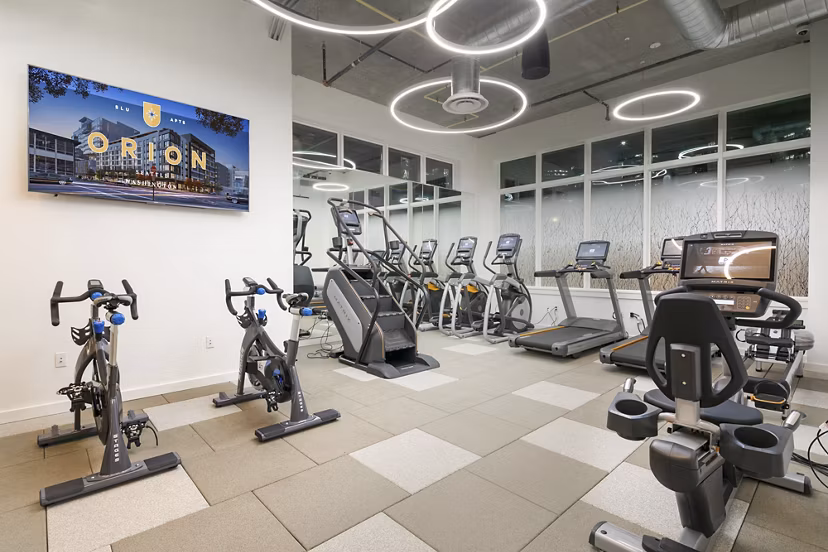 fitness center at  Orion Apartments
