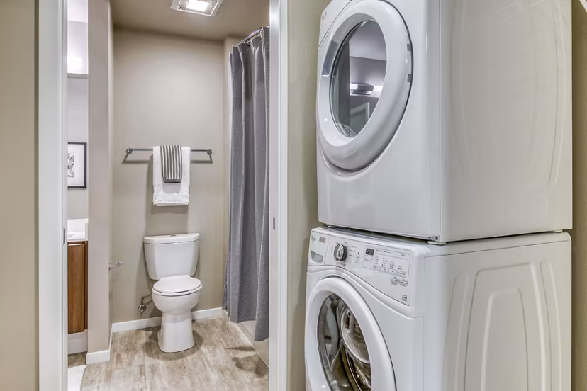 laundry and bathroom at Orion Apartments