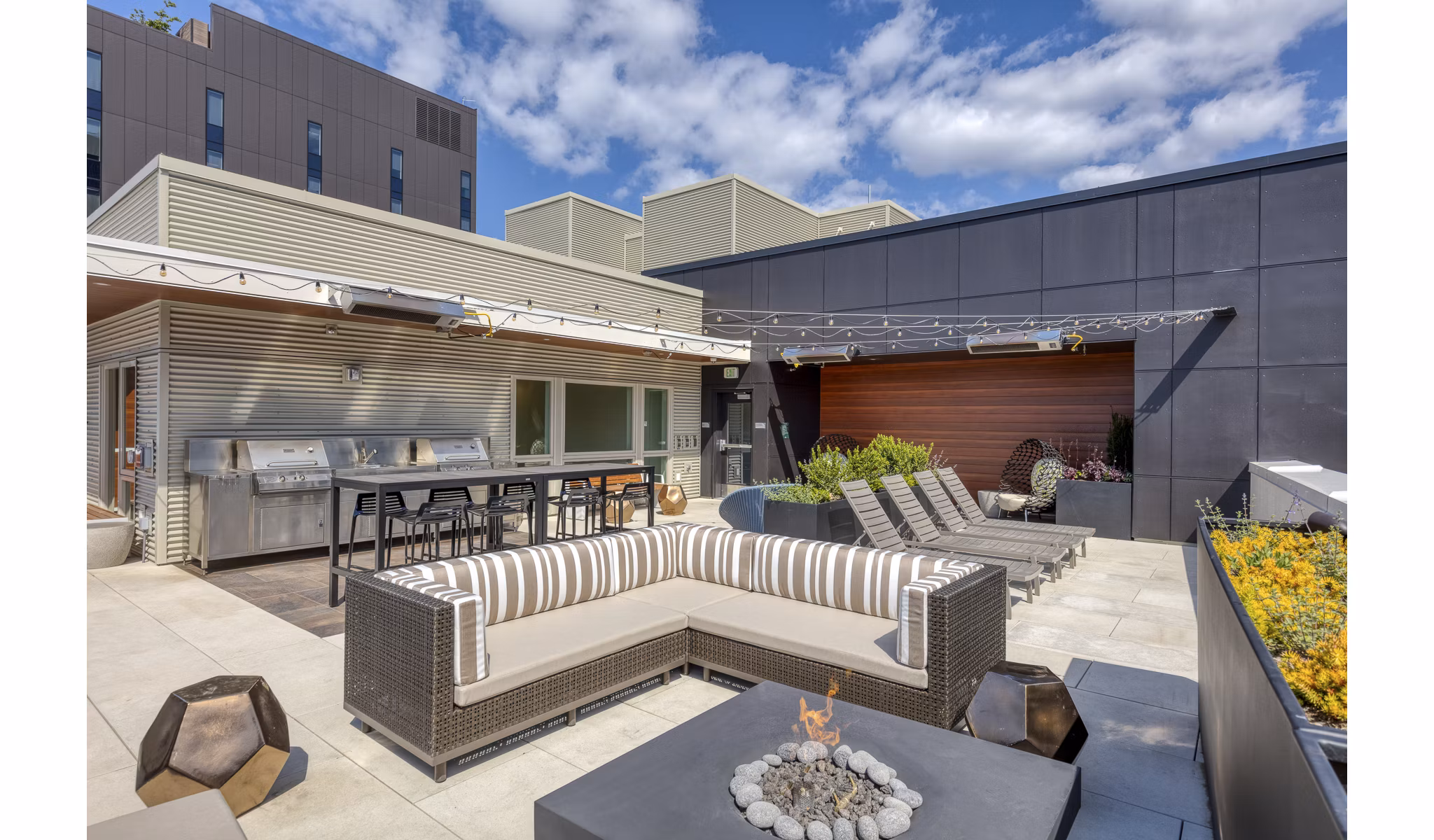 fire pit/patio at  Orion Apartments