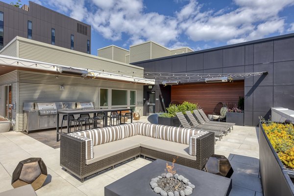 fire pit/patio at  Orion Apartments