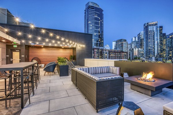 fire pit/patio at  Orion Apartments