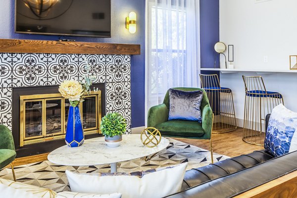 Clubhouse lobby with elegant seating and modern decor at The Village at Tierra Antigua Apartments