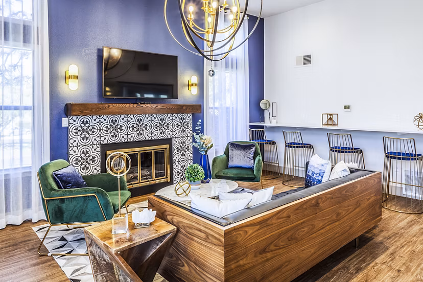 Clubhouse lobby featuring modern furnishings and open layout at The Village at Tierra Antigua Apartments