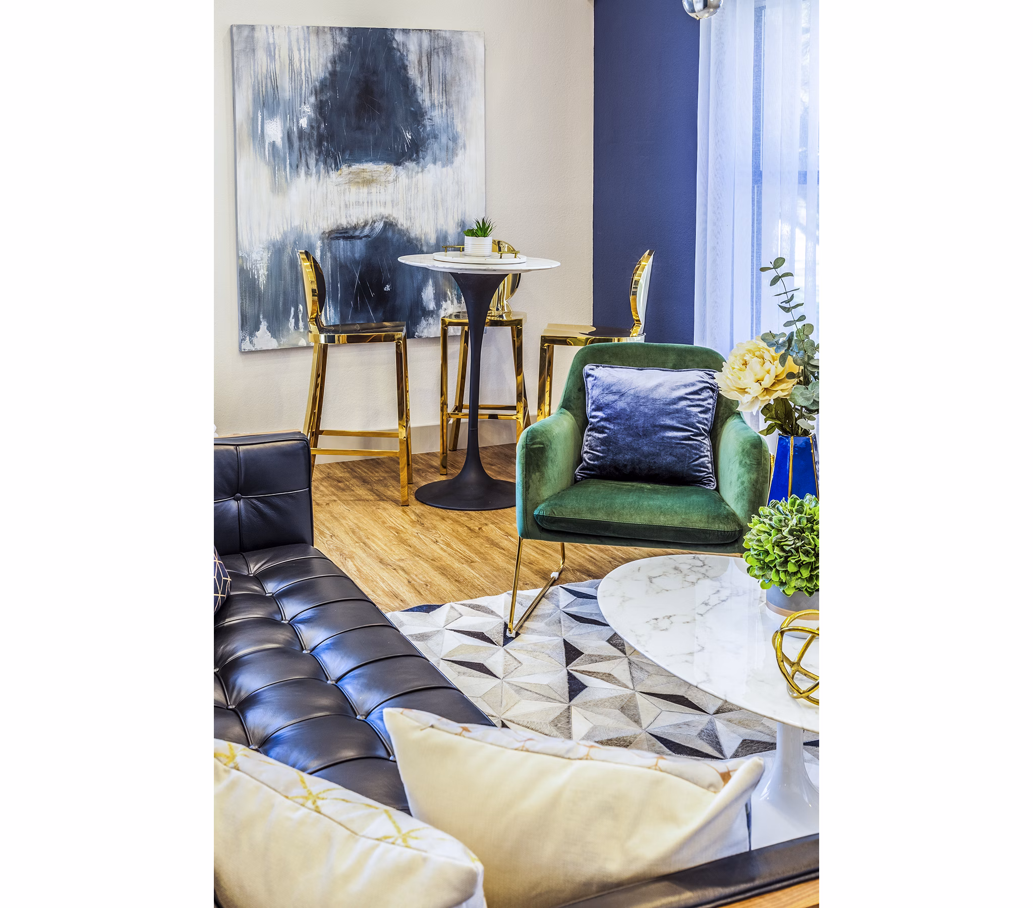 Clubhouse lobby with modern seating and stylish decor at The Village at Tierra Antigua Apartments