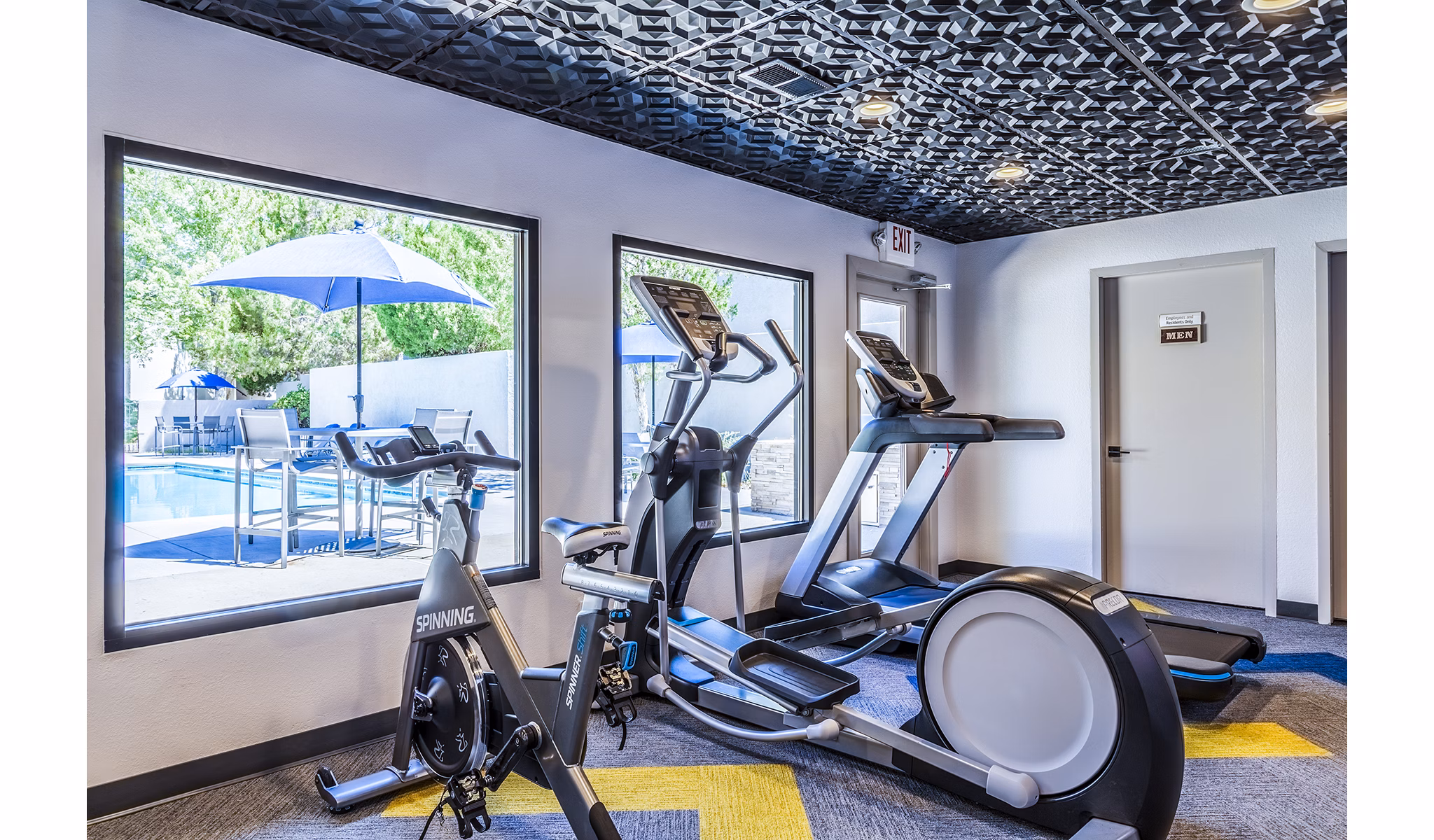 State-of-the-art fitness center featuring modern equipment at The Village at Tierra Antigua Apartments