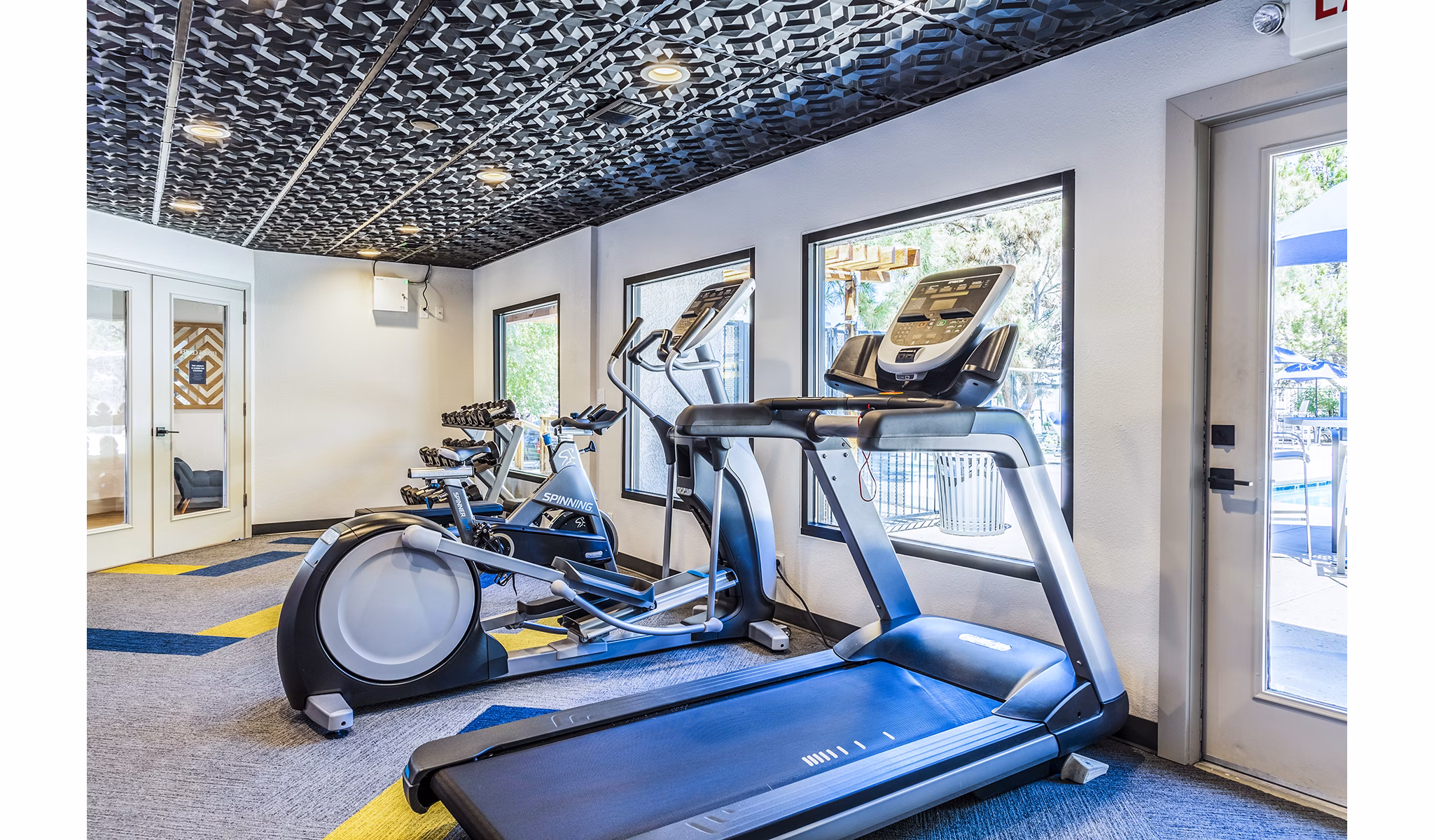 State-of-the-art fitness center with modern equipment at The Village at Tierra Antigua Apartments