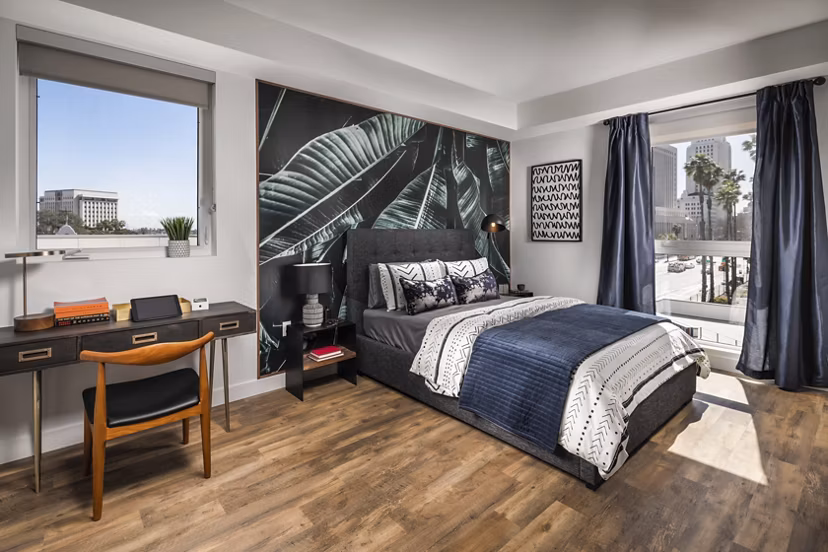 Spacious bedroom with modern decor at LA Plaza Village Apartments