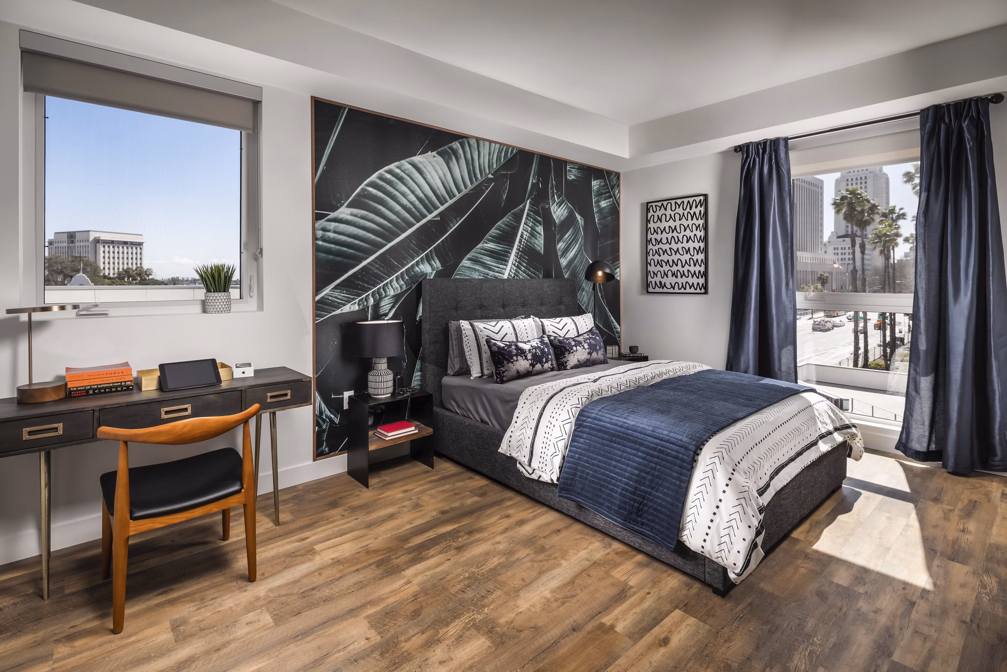 Spacious bedroom with modern decor at LA Plaza Village Apartments