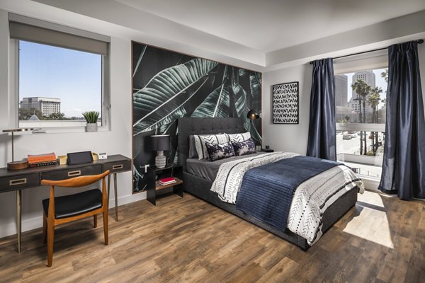 Spacious bedroom with modern decor at LA Plaza Village Apartments
