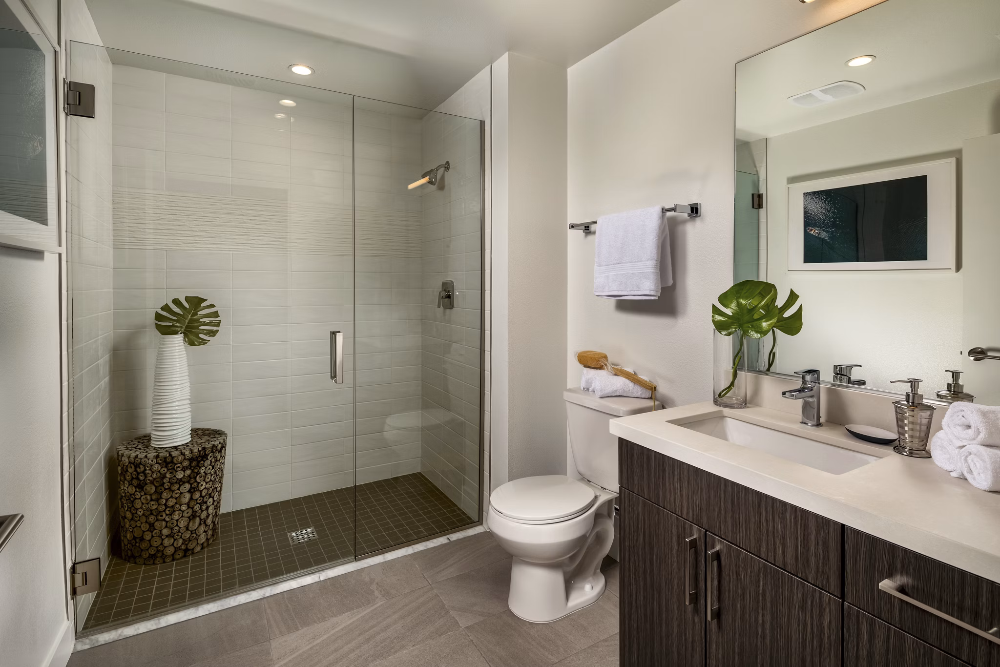 Modern bathroom with sleek fixtures at LA Plaza Village Apartments, featuring luxury design elements for a contemporary living experience