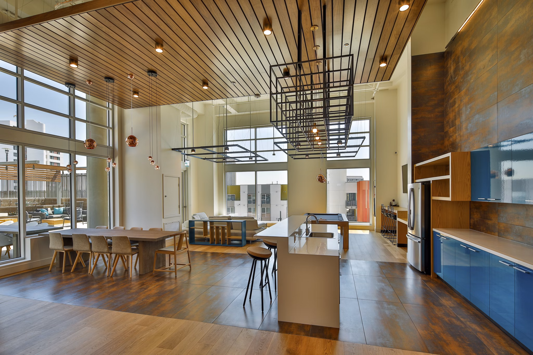 Stylish clubhouse with modern furnishings at LA Plaza Village Apartments, Los Angeles
