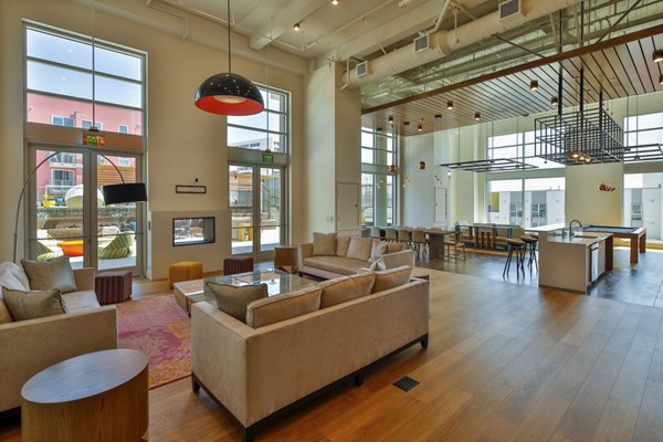 Stylish clubhouse featuring modern dÃ©cor at LA Plaza Village Apartments in Los Angeles
