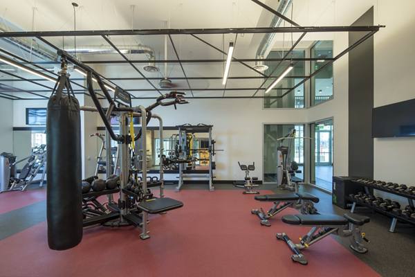 fitness center at LA Plaza Village Apartments
