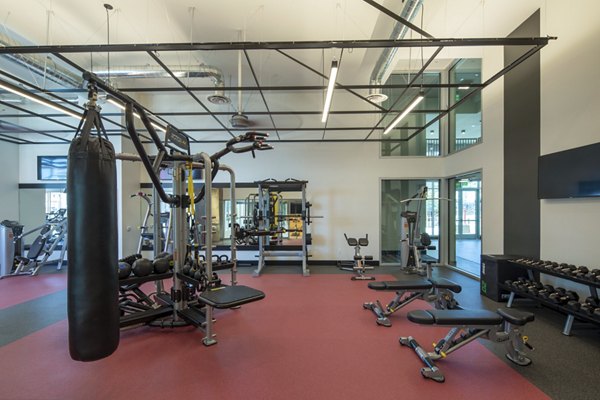 fitness center at LA Plaza Village Apartments