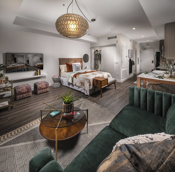 Modern kitchen with stainless steel appliances at LA Plaza Village Apartments, offering luxury living spaces in Los Angeles