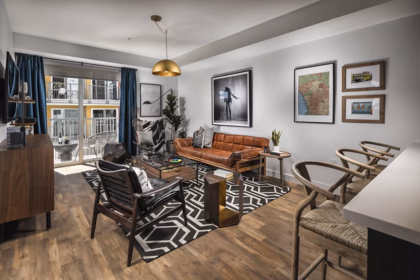 Spacious living room with contemporary decor at LA Plaza Village Apartments in Los Angeles, ideal for luxury living