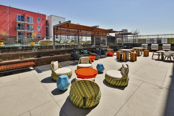 Rooftop deck with lounge seating at LA Plaza Village luxury apartments