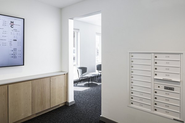 Mail room and parcel pickup area at Union House Apartments with secure package lockers