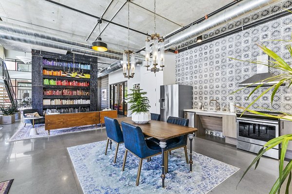 Clubhouse lounge with modern seating in West Village Apartments, Greystar luxury community