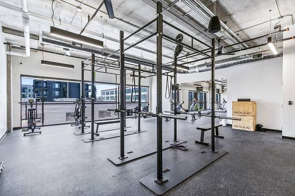 fitness center at West Village Apartments