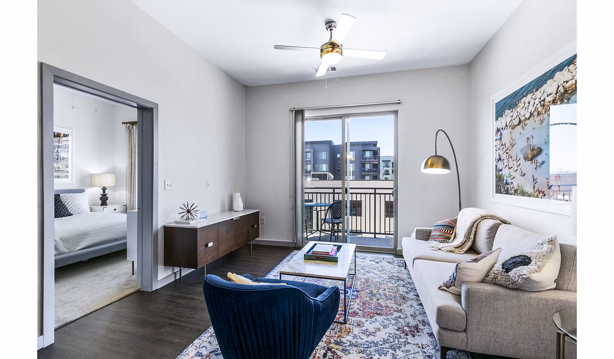 Spacious living room with modern decor in West Village Apartments, luxury residences by Greystar