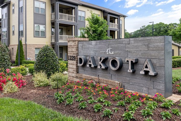 Dakota Apartments: Signage at luxury apartment complex in a desirable urban setting