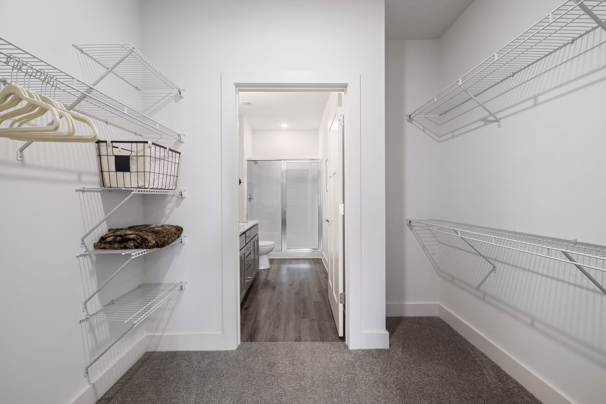 Cozy bedroom with modern decor at The Dakota Apartments luxury community