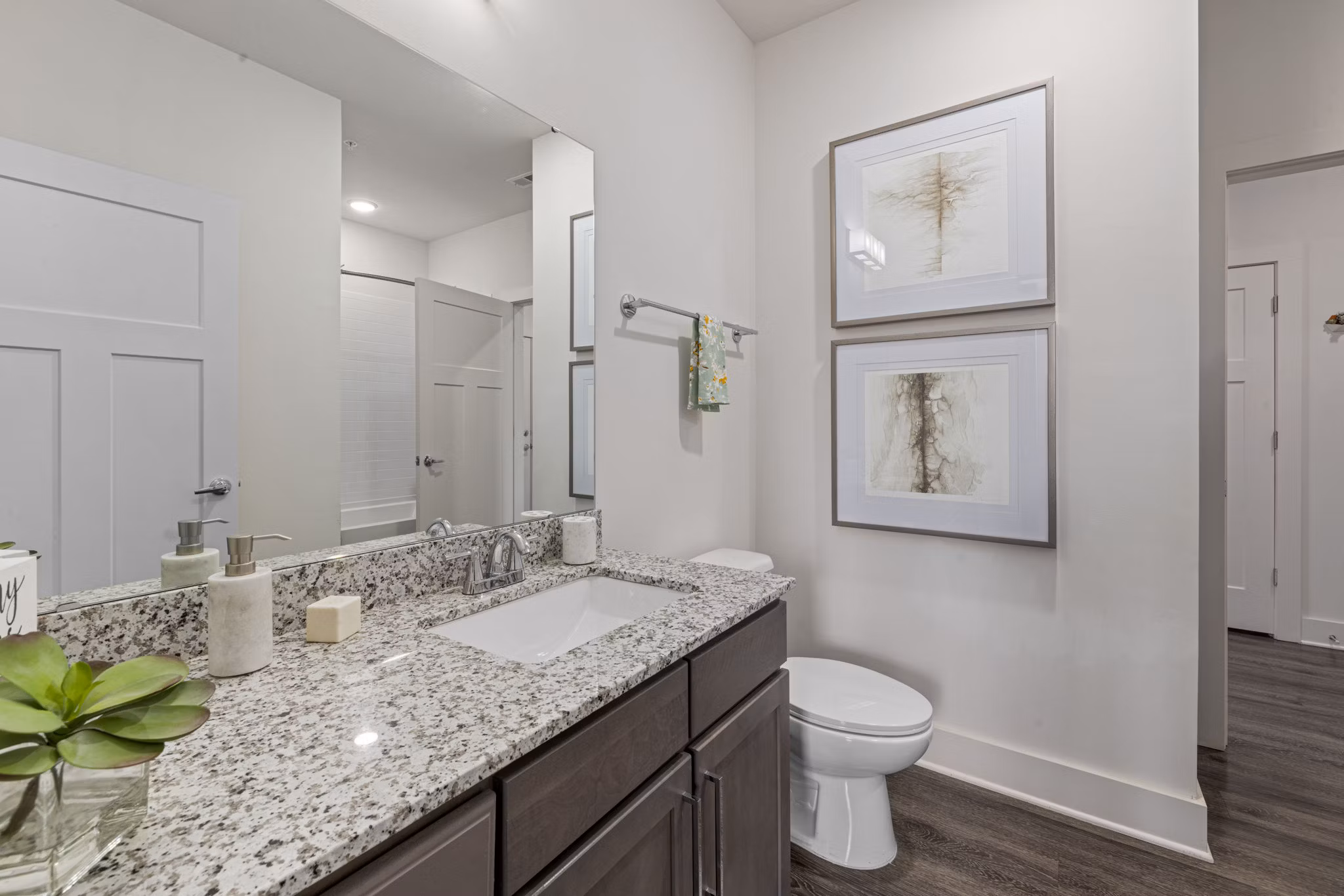 Bathroom featuring sleek fixtures and modern design in The Dakota Apartments